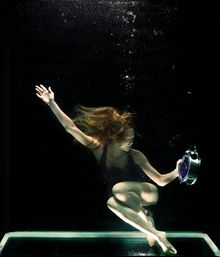 Girl underwater with clock.jpg